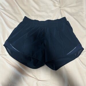 Women’s Lululemon 4” size 6 Navy blue Hotty hot low-rise short